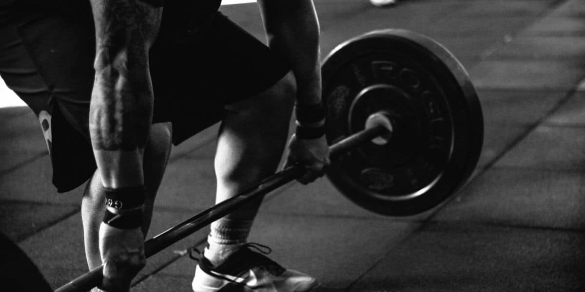 Swimmer lifting weights