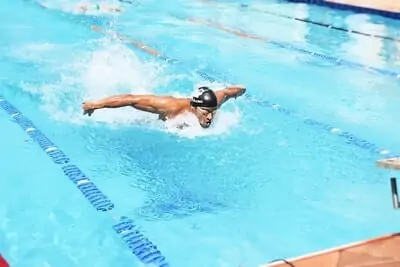 butterfly swimmer with tech suit