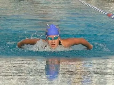 woman swimming butterfly